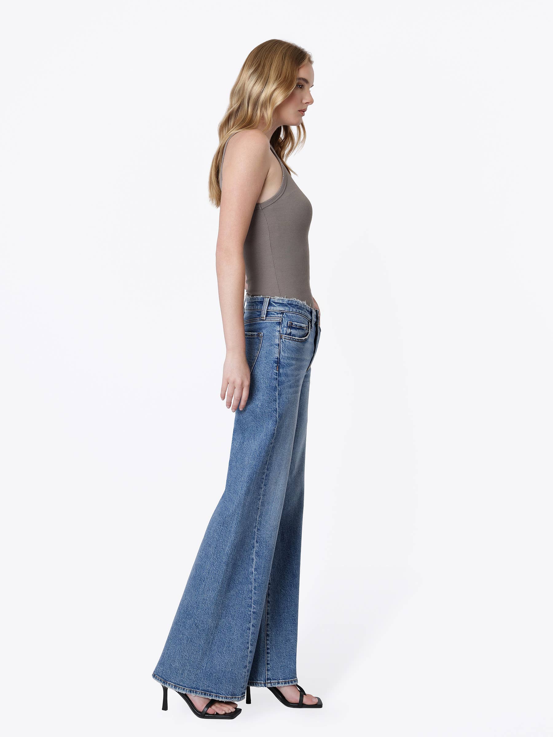 Mid Rise Distressed Waistband Twisted Wide Jeans